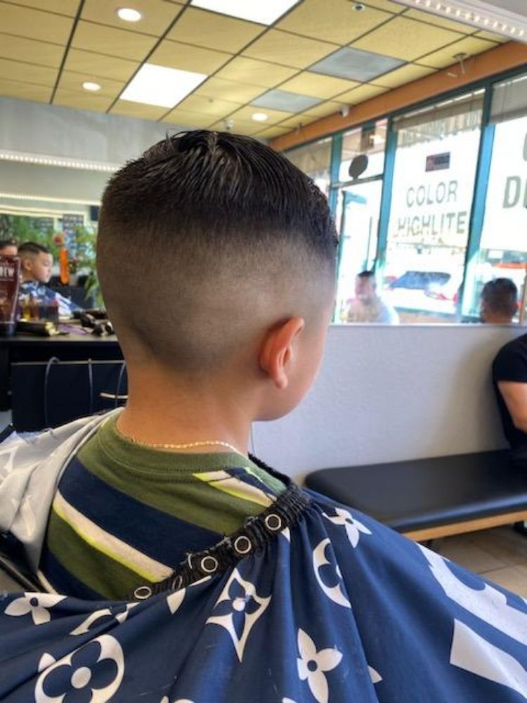 A finished taper fade, cut at Khamy's Hair
